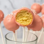Delicious Starbucks cake pop recipe with vanilla cake and pink candy coating.