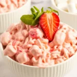 Strawberry Fluff dessert salad made with fresh strawberries, marshmallows, and pineapple