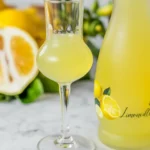 A step-by-step guide to making homemade limoncello with fresh lemon peels and vodka.